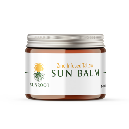 Sunroot Zinc Infused Tallow Sun Balm in an amber glass jar with aluminum lid on a white background.