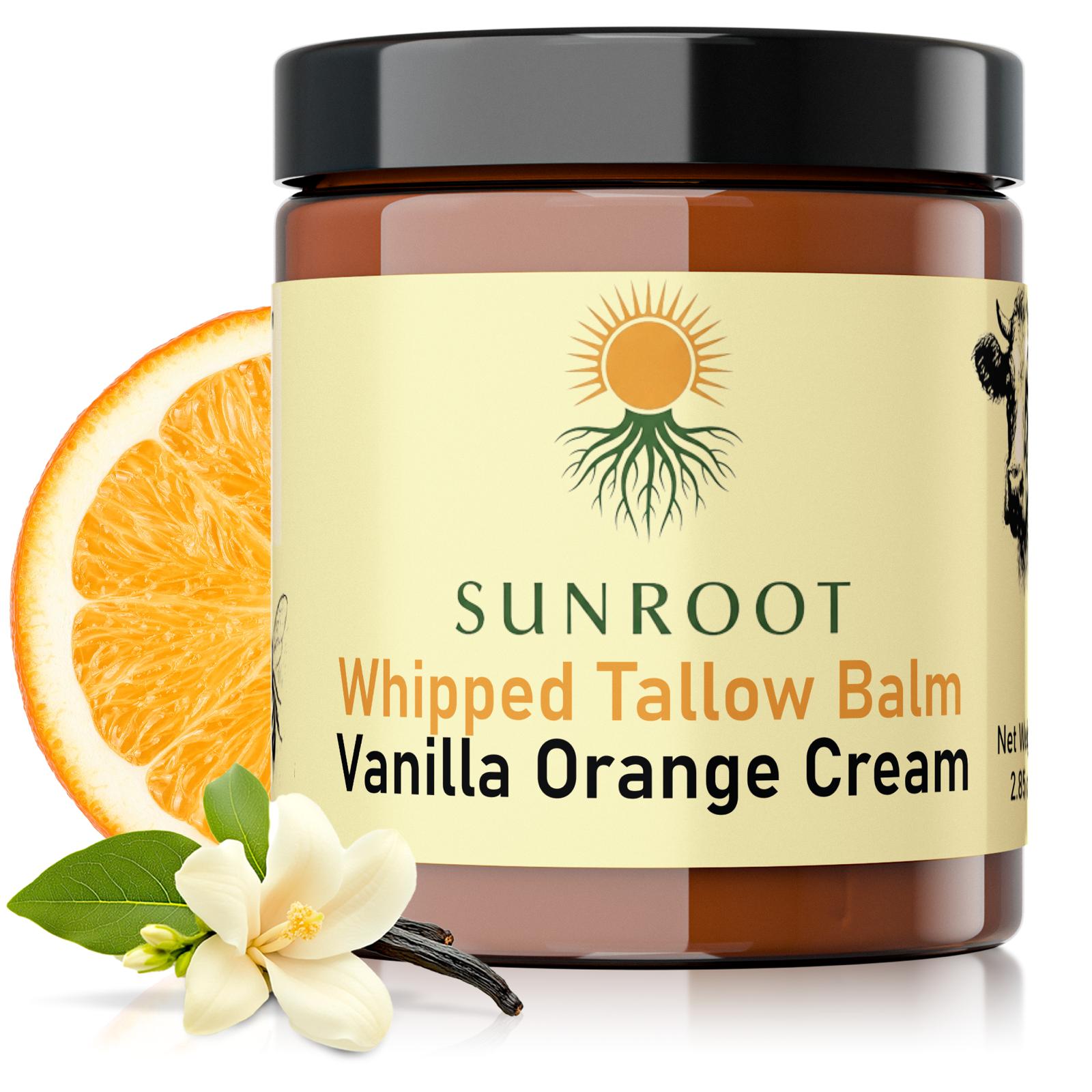 Sunroot Vanilla Orange Cream whipped tallow balm in an amber glass jar with orange slice and vanilla flower accents.